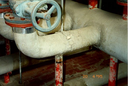 9 Particolare di tubazione rivestita con malta contenente amianto.png